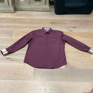 Burgundy classic Burberry men’s collared shirt.